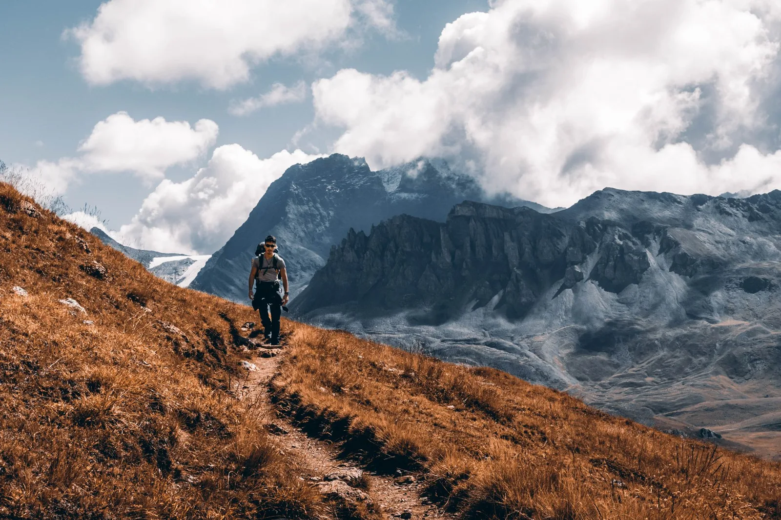 hiker on a mountain trail — how to meditate with sensitivity